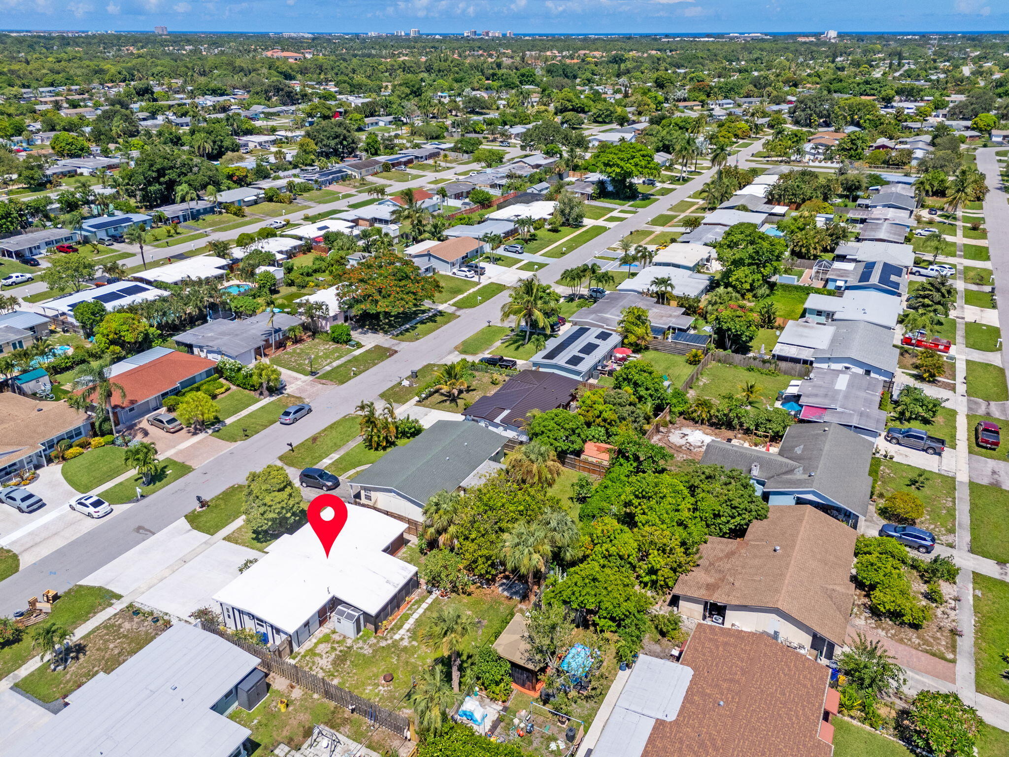 3852 Catalina Road Palm Beach Gardens, FL 33410 - Photo 41 of 48 an aerial view of residential houses with outdoor space and street view