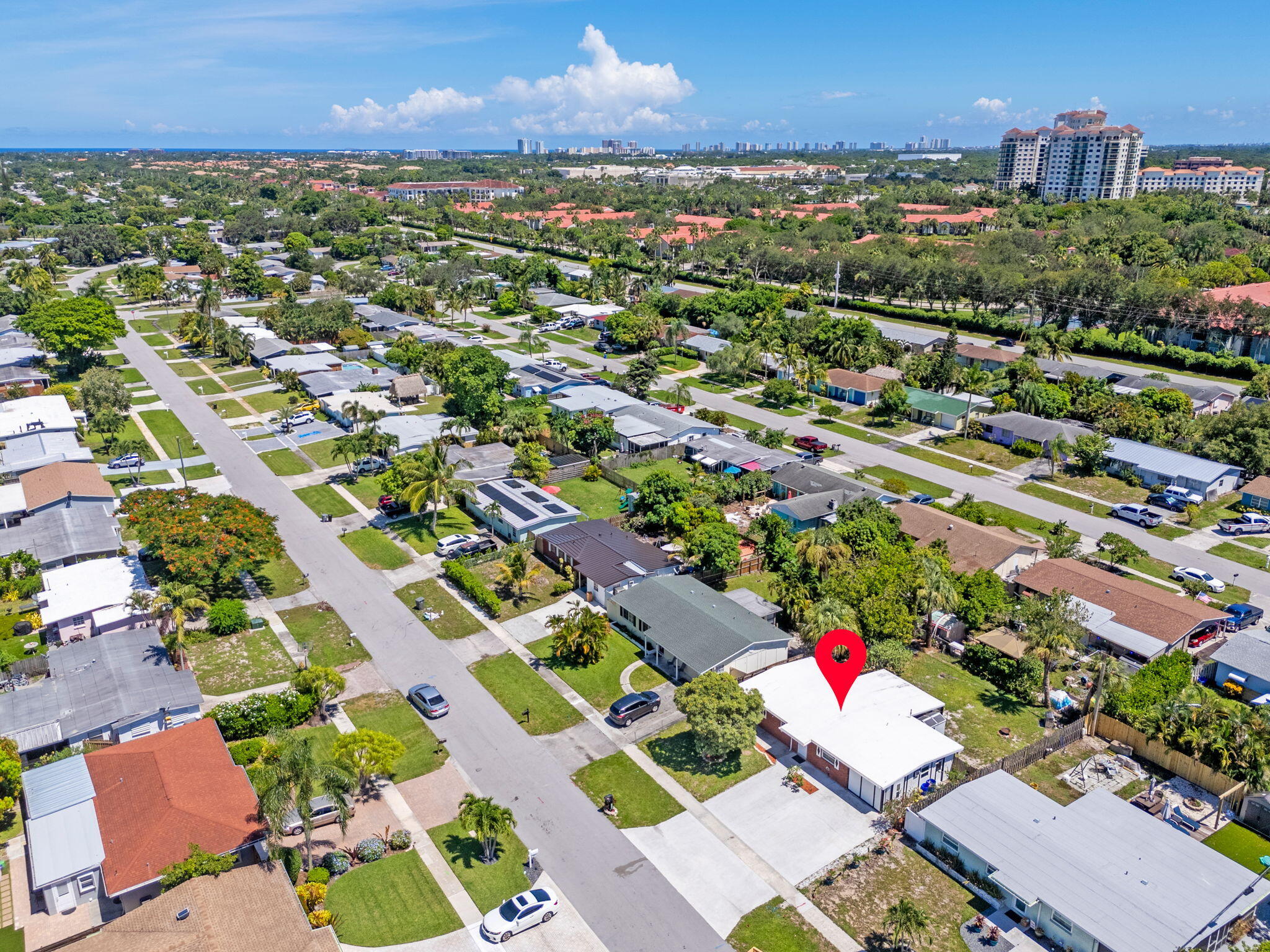 3852 Catalina Road Palm Beach Gardens, FL 33410 - Photo 43 of 48 an aerial view of residential houses with outdoor space and street view