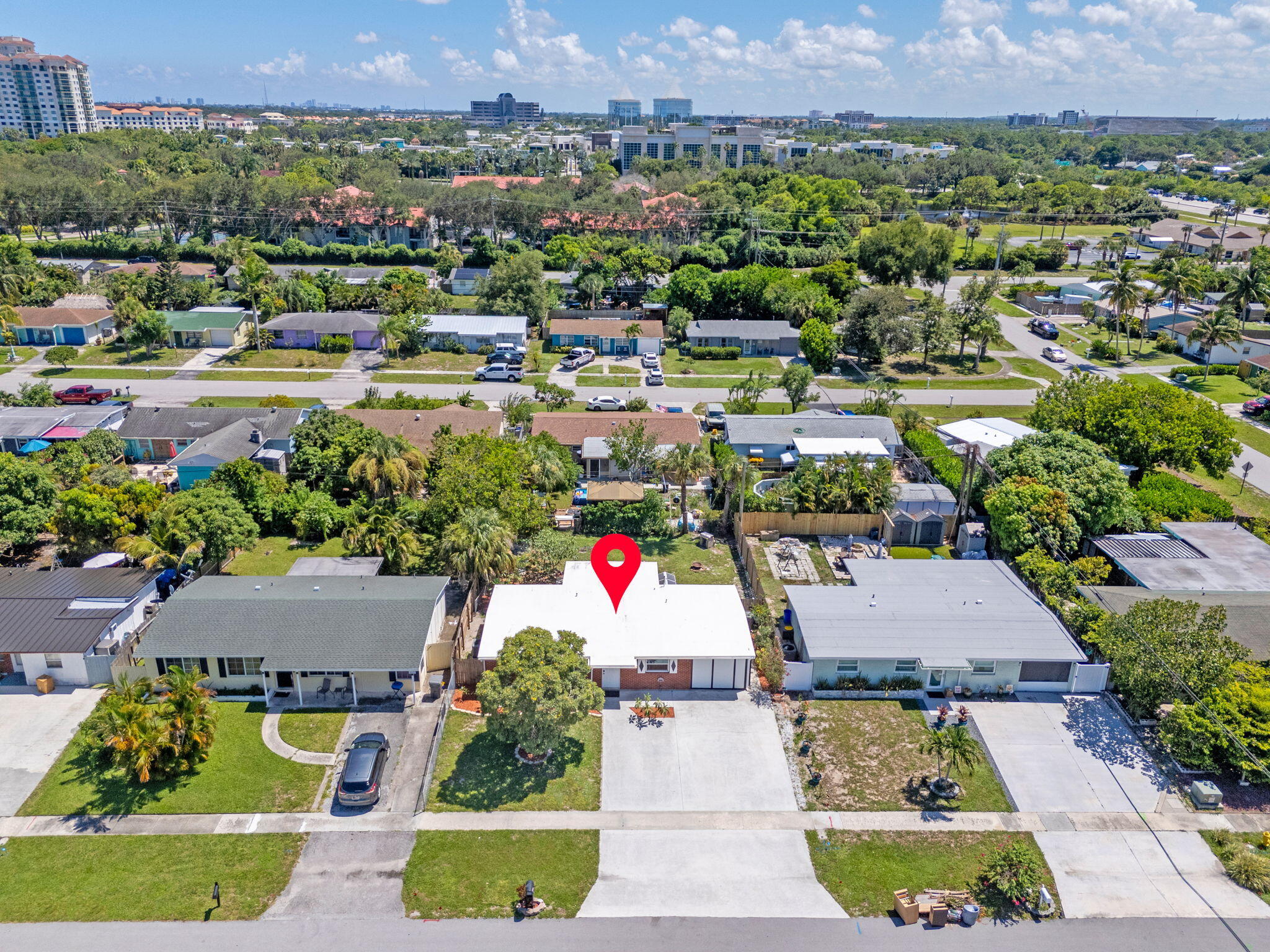3852 Catalina Road Palm Beach Gardens, FL 33410 - Photo 47 of 48 an aerial view of residential houses and outdoor space