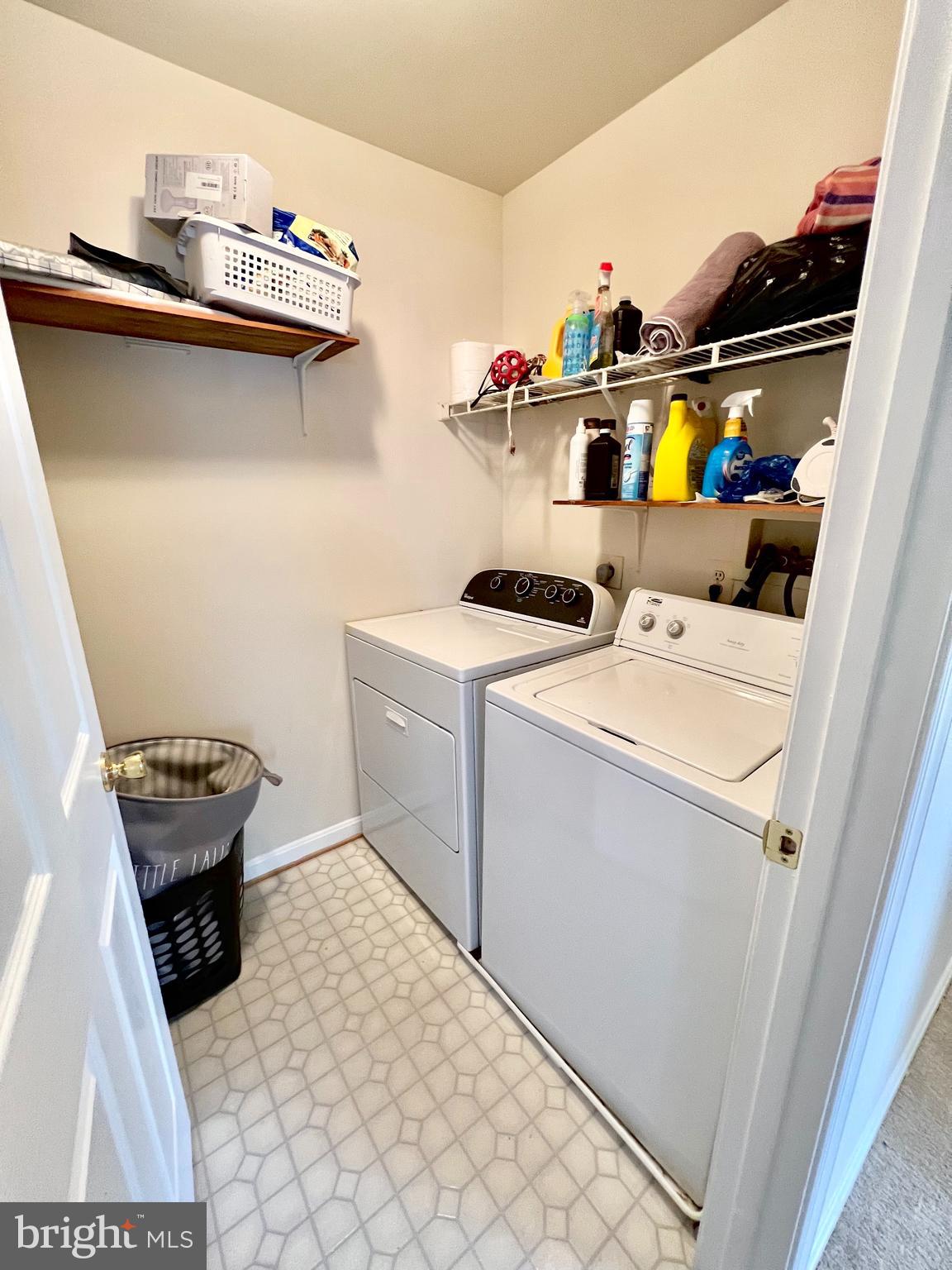 2104 Whitehall Road, Unit 1D Frederick, MD 21702 - Photo 4 of 9 a utility room with dryer and washer