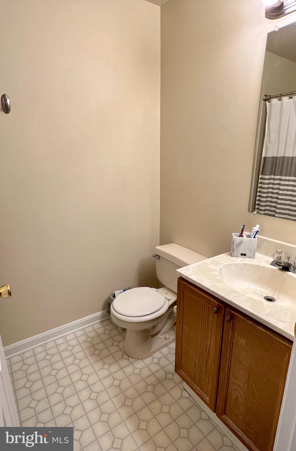 2104 Whitehall Road, Unit 1D Frederick, MD 21702 - Photo 6 of 9 a bathroom with a sink and a toilet