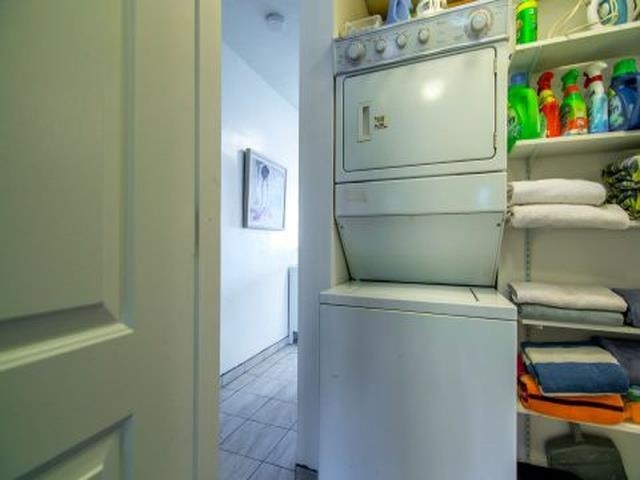 2075 South Kihei Road, Unit 114 Kihei, HI 96753 - Photo 12 of 14 a utility room with dryer and washer