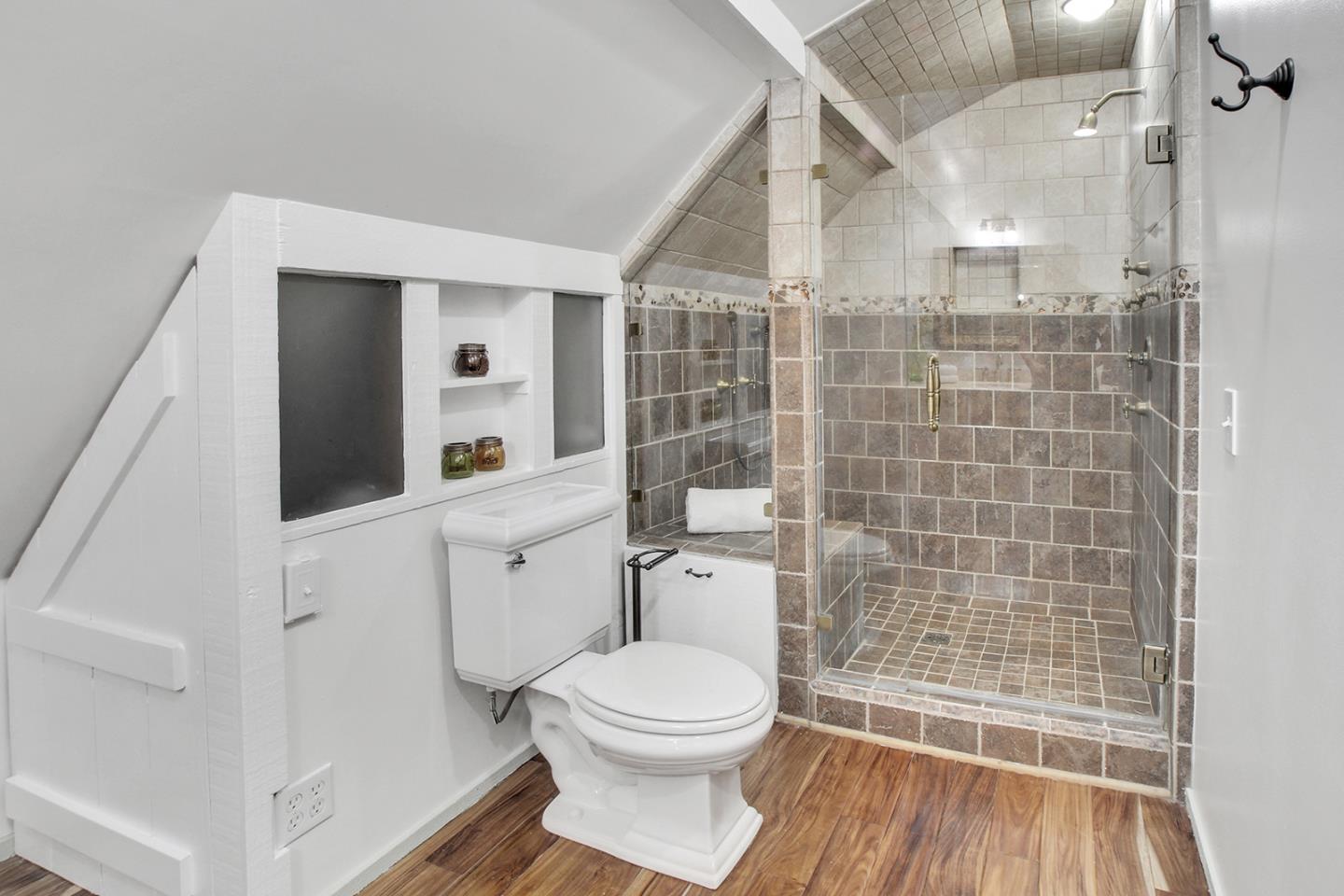 165 Old Ranch Road Woodside, CA 94062 - Photo 37 of 60 a bathroom with a toilet and a shower