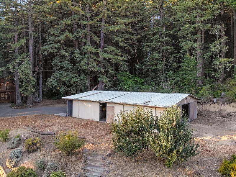 165 Old Ranch Road Woodside, CA 94062 - Photo 47 of 60 a view of a house with backyard and trees
