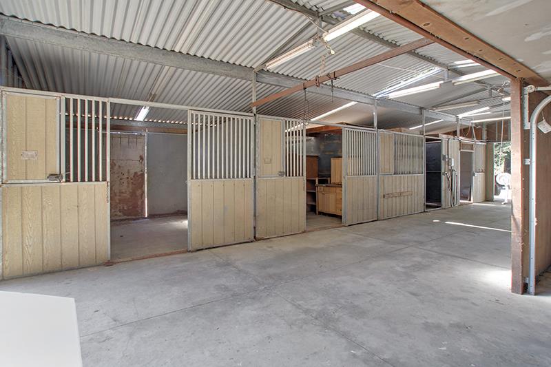 165 Old Ranch Road Woodside, CA 94062 - Photo 48 of 60 a view of empty room with wooden walls