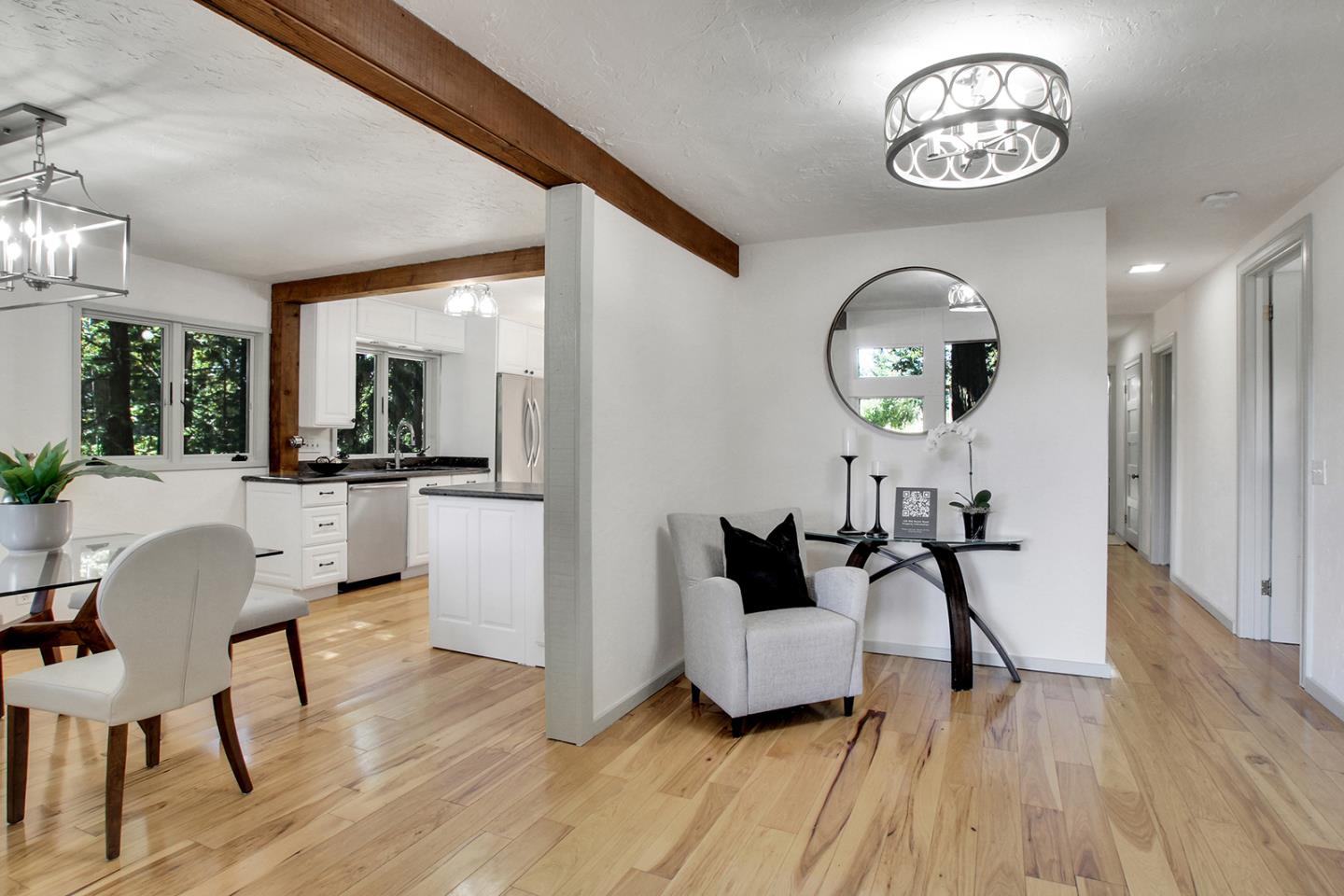 165 Old Ranch Road Woodside, CA 94062 - Photo 5 of 60 a living room with furniture and a wooden floor