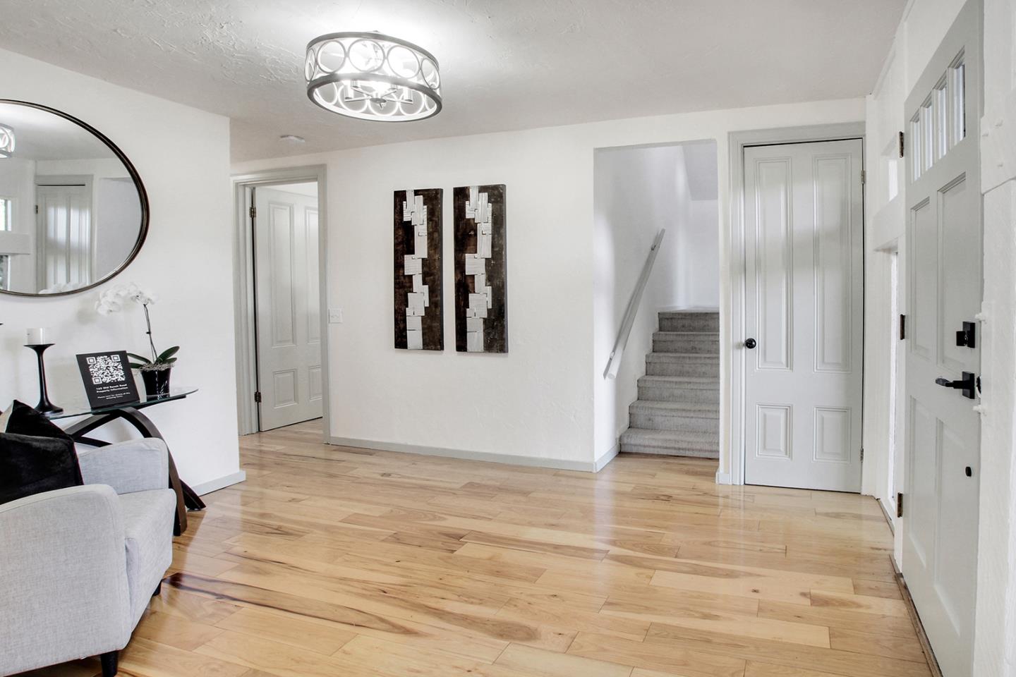 165 Old Ranch Road Woodside, CA 94062 - Photo 7 of 60 a view of a livingroom with furniture and entryway