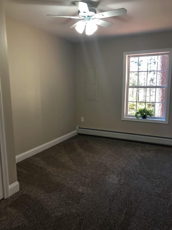 499 Jacksonville Road Colrain, MA 01340 - Photo 16 of 30 an empty room with a window