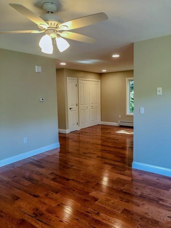 499 Jacksonville Road Colrain, MA 01340 - Photo 21 of 30 a view of empty room with wooden floor