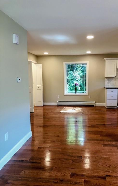 499 Jacksonville Road Colrain, MA 01340 - Photo 22 of 30 a view of a room with wooden floor