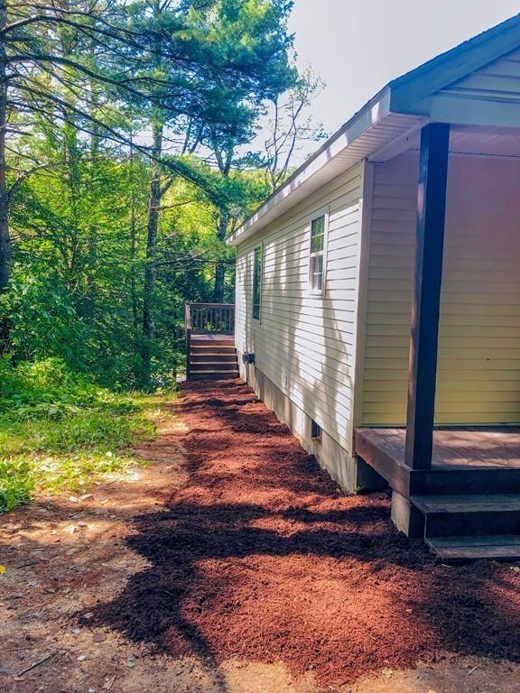 499 Jacksonville Road Colrain, MA 01340 - Photo 25 of 30 a view of a backyard with side of a house