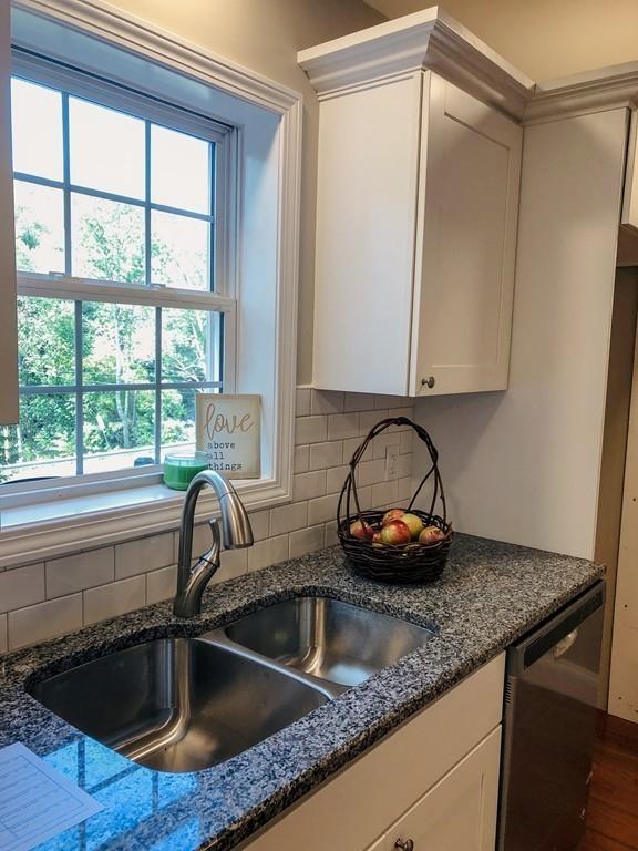 499 Jacksonville Road Colrain, MA 01340 - Photo 9 of 30 a kitchen with granite countertop a sink and a window