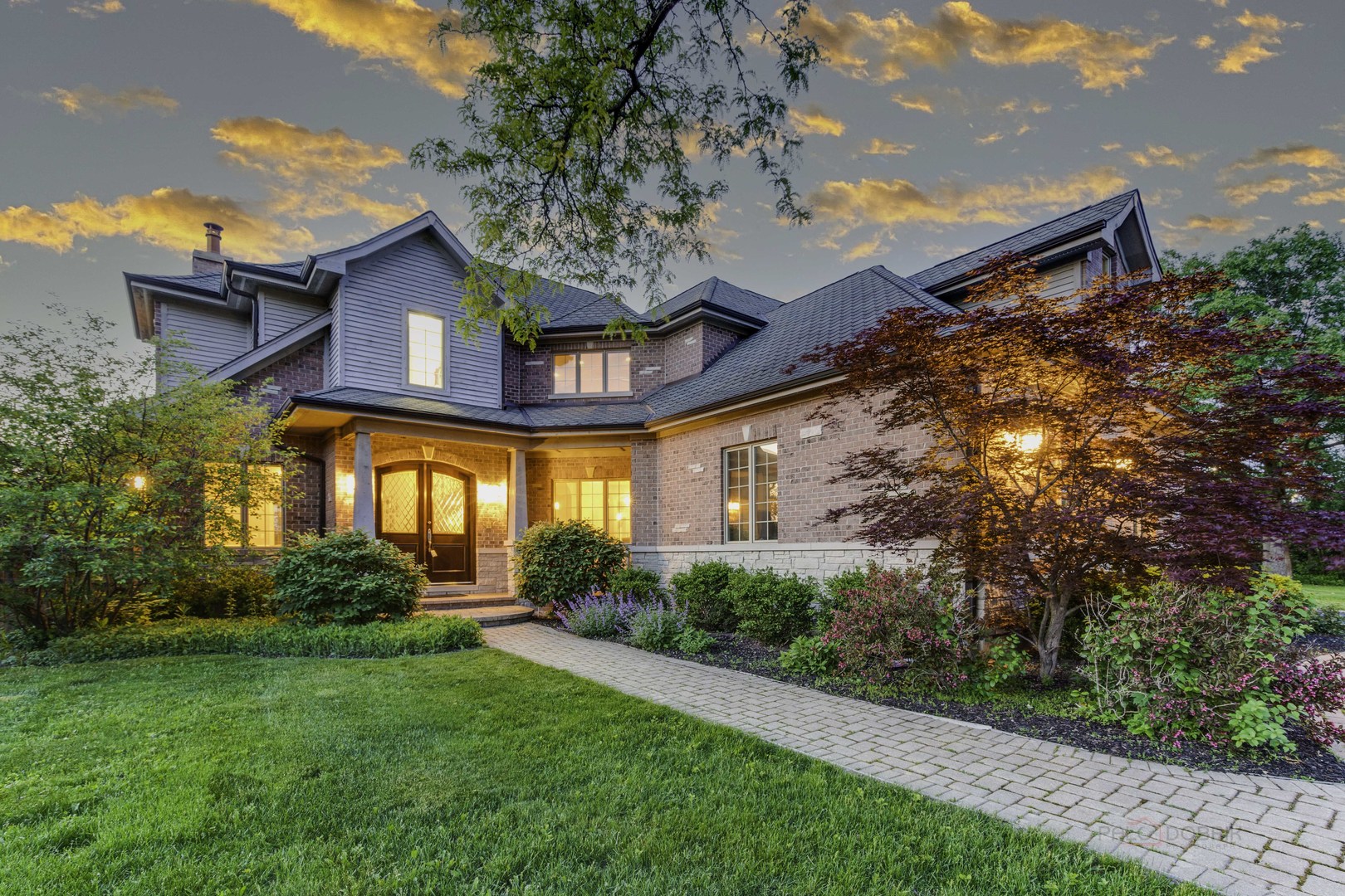 214 Linden Road Northbrook, IL 60062 - Photo 1 of 56 a front view of a house with a yard