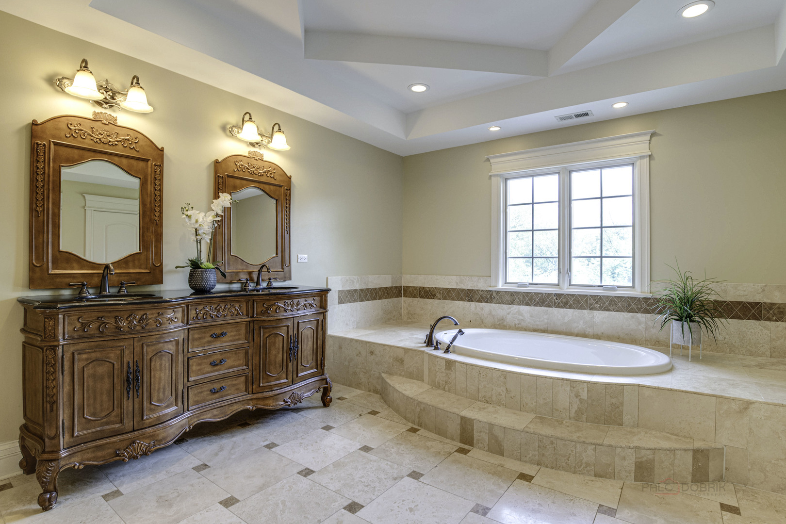 214 Linden Road Northbrook, IL 60062 - Photo 30 of 56 a spacious bathroom with a tub sink and mirror