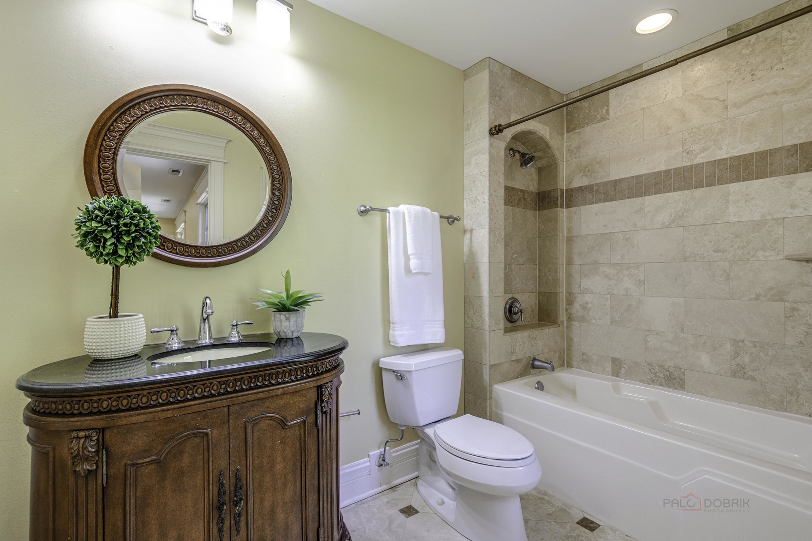 214 Linden Road Northbrook, IL 60062 - Photo 34 of 56 a bathroom with a toilet sink and mirror