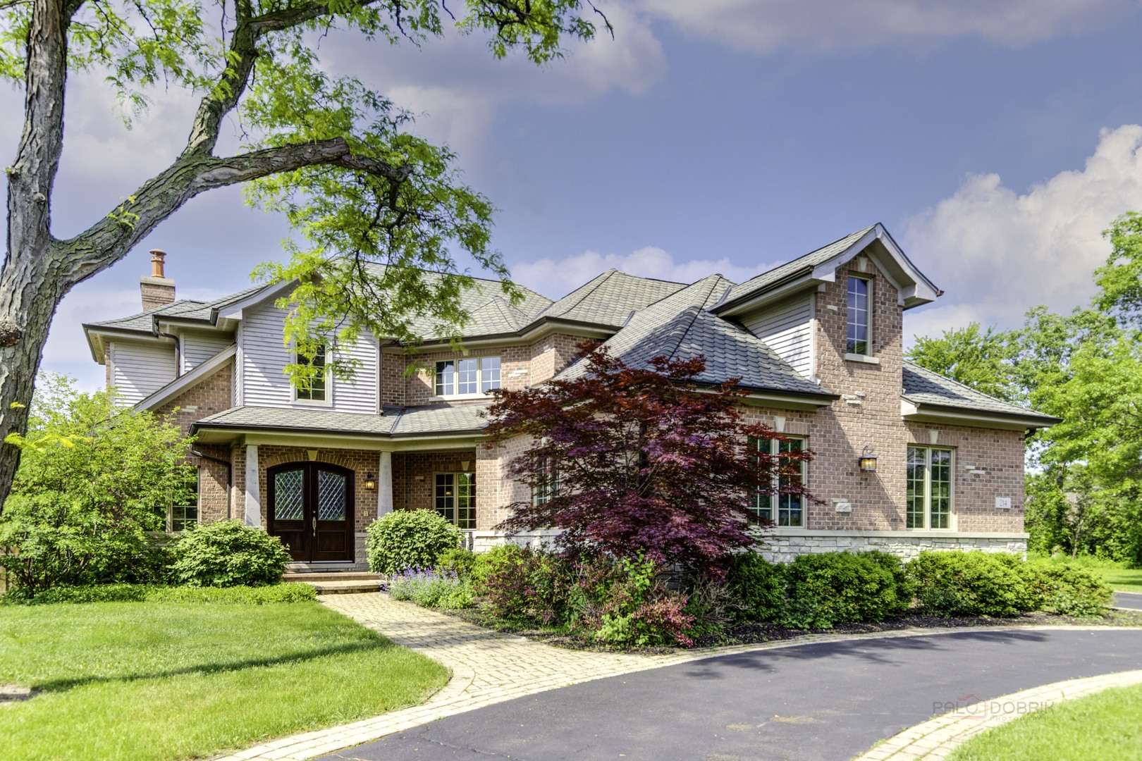 214 Linden Road Northbrook, IL 60062 - Photo 4 of 56 front view of a house with a yard