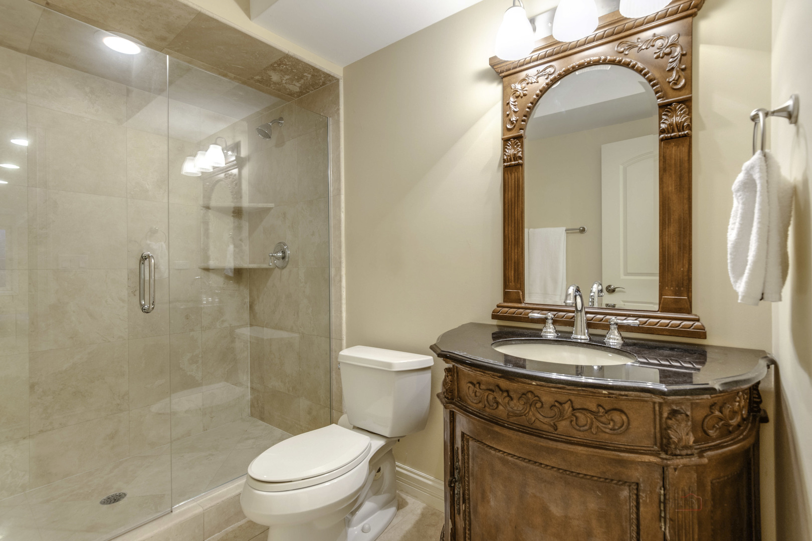 214 Linden Road Northbrook, IL 60062 - Photo 45 of 56 a bathroom with a sink toilet and shower