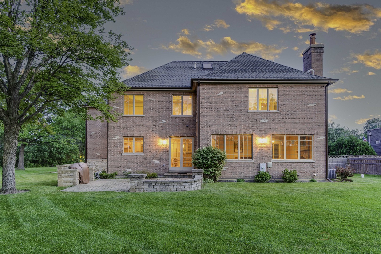 214 Linden Road Northbrook, IL 60062 - Photo 46 of 56 a front view of a house with a yard and trees