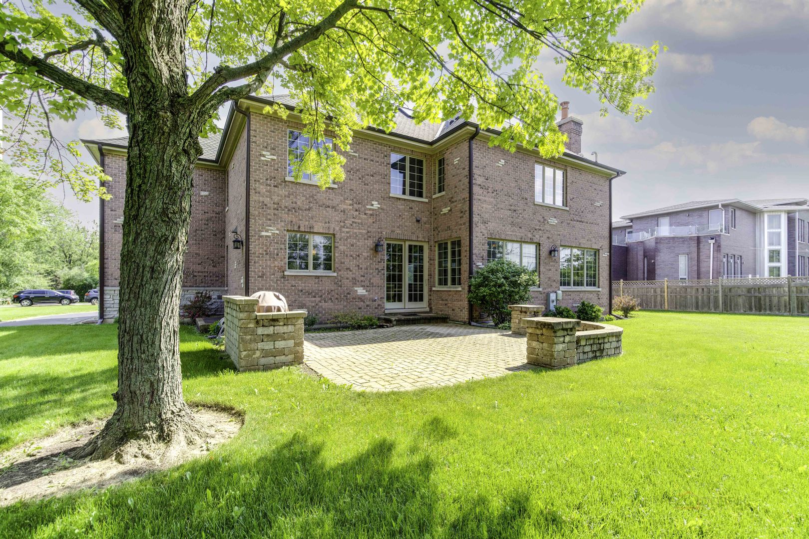 214 Linden Road Northbrook, IL 60062 - Photo 47 of 56 a view of a house with a swimming pool and a chairs