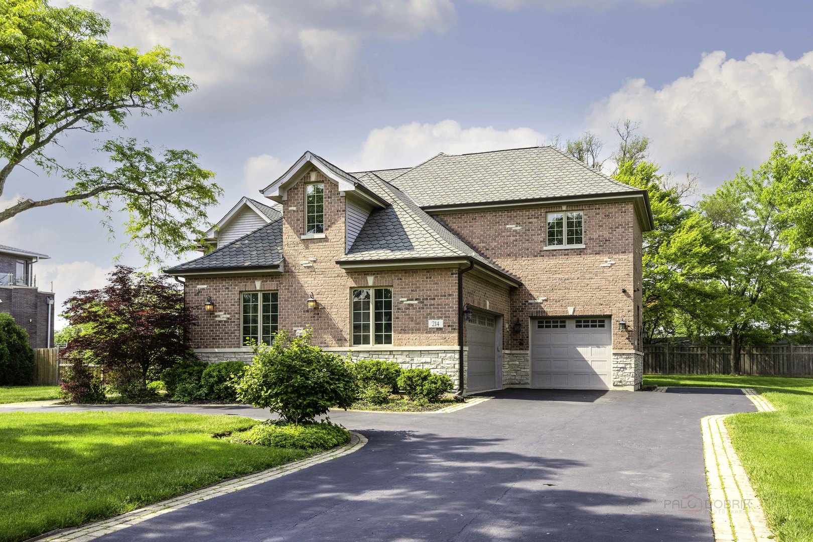 214 Linden Road Northbrook, IL 60062 - Photo 5 of 56 front view of a house with a yard