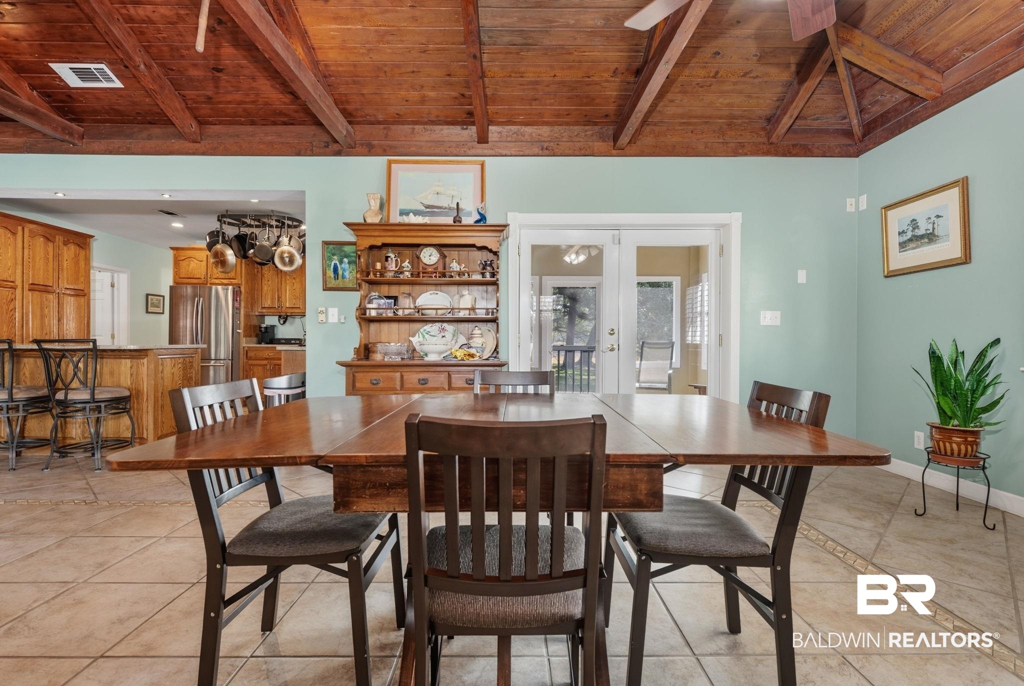 15025 Bellingrath Road Coden, AL 36523 - Photo 42 of 79 Dining space featuring wood ceiling, french doors, and lofted ceiling with beams