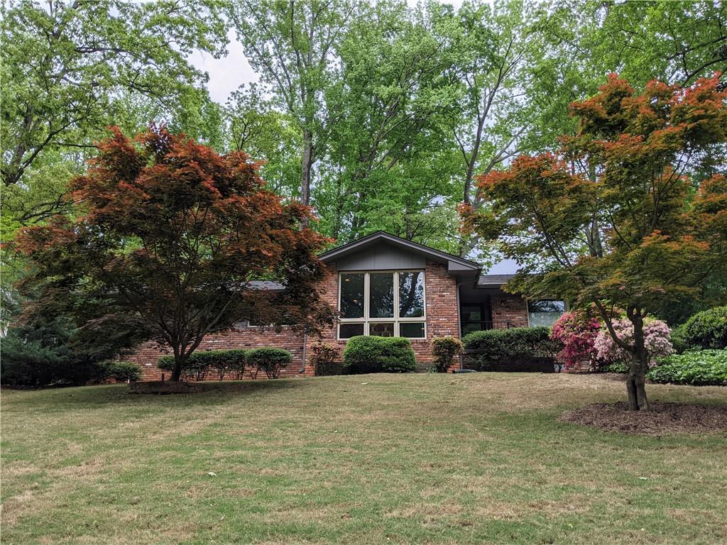 146 East Parkwood Road Decatur, GA 30030 - Photo 1 of 1 a view of a house with a yard