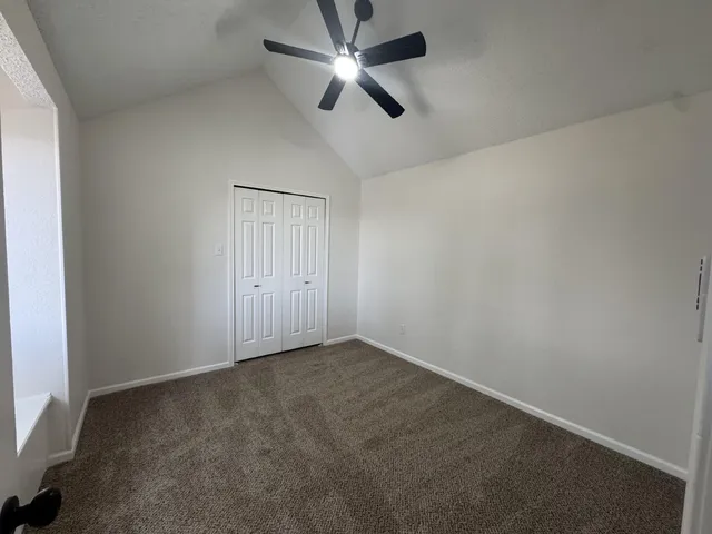 an empty room with fan