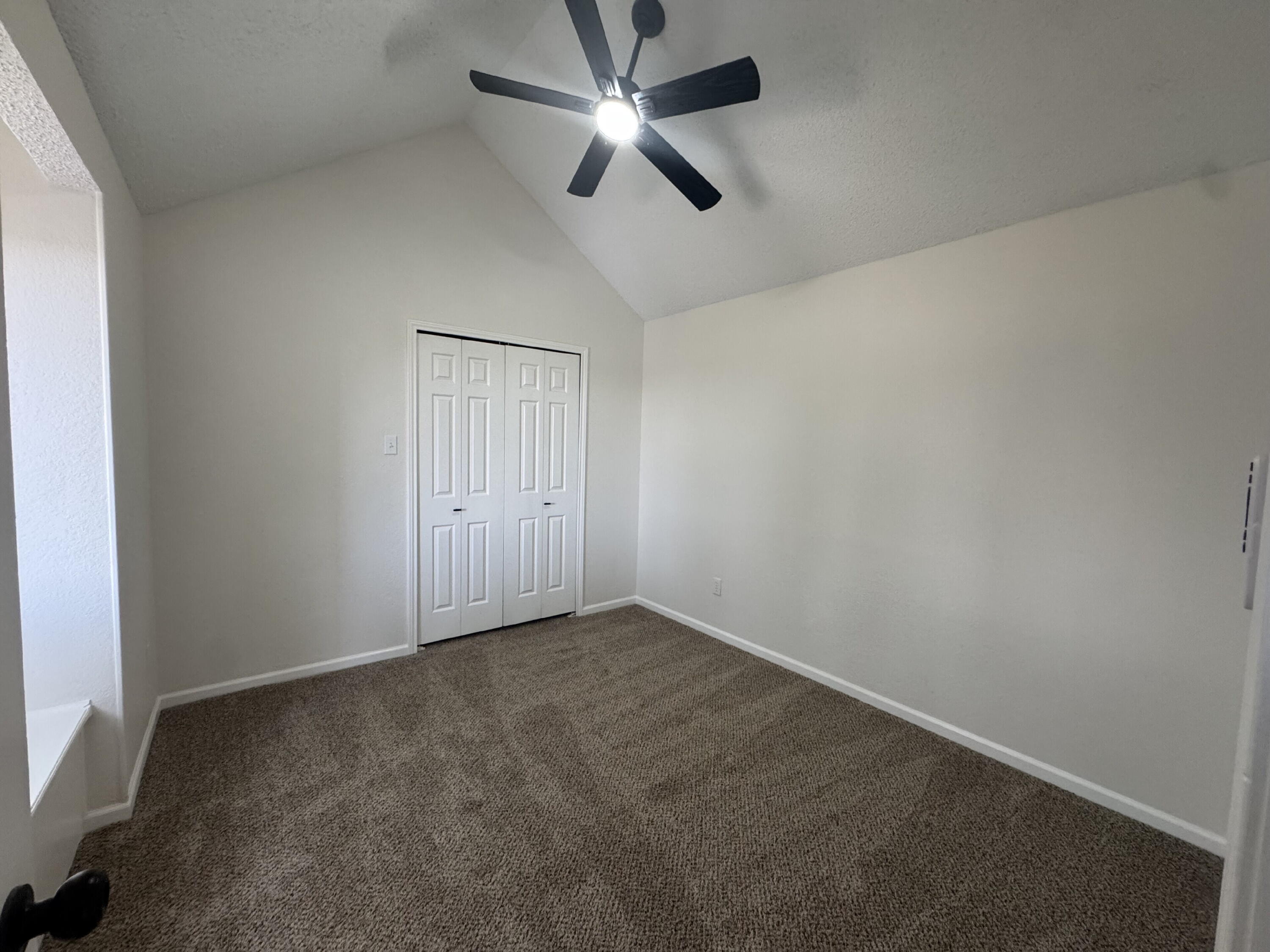 5510 87th Street Lubbock, TX 79424 - Photo 12 of 13 an empty room with fan
