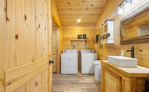 a view of a kitchen with furniture and a kitchen