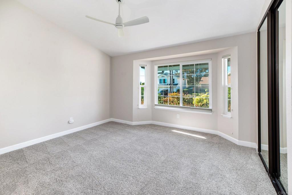 2725 Glasgow Drive Carlsbad, CA 92010 - Photo 22 of 41 a view of an empty room with a window