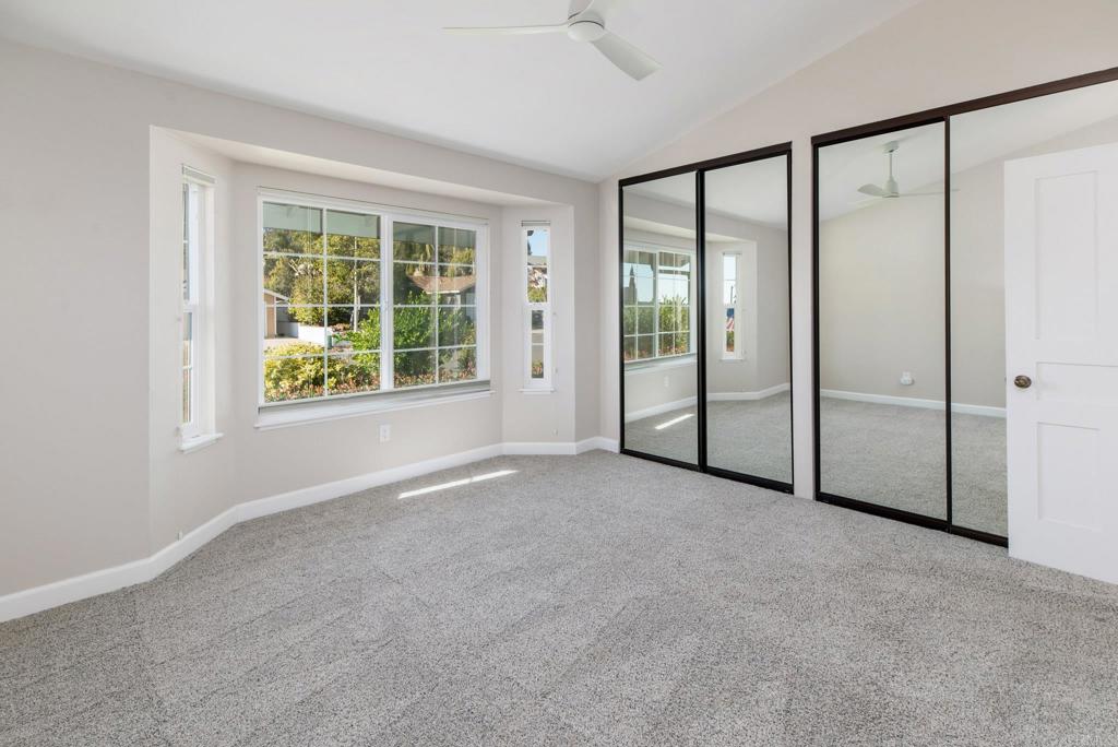 2725 Glasgow Drive Carlsbad, CA 92010 - Photo 23 of 41 an empty room with windows and closet