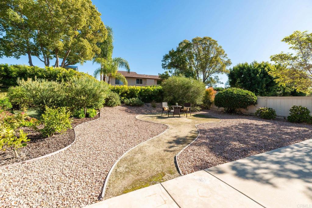 2725 Glasgow Drive Carlsbad, CA 92010 - Photo 25 of 41 a view of a garden with a pathway
