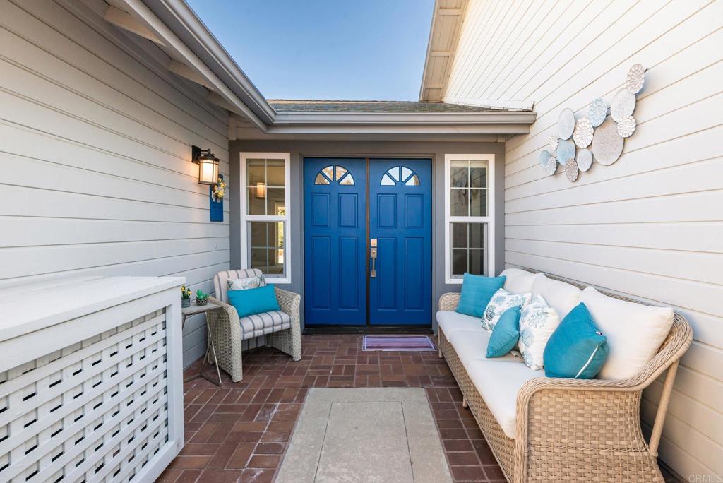 2725 Glasgow Drive Carlsbad, CA 92010 - Photo 3 of 41 a front view of a house with outdoor seating