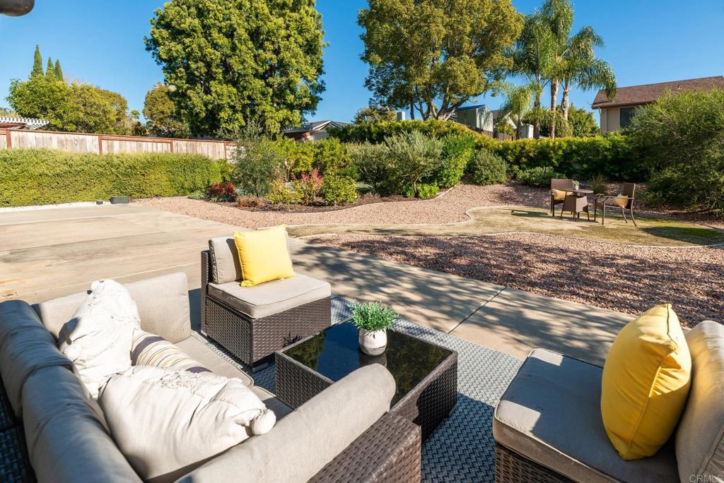 2725 Glasgow Drive Carlsbad, CA 92010 - Photo 31 of 41 a view of a patio with couches and a fire pit