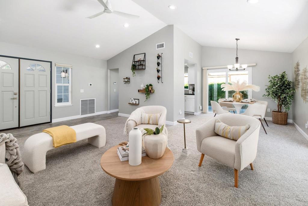 2725 Glasgow Drive Carlsbad, CA 92010 - Photo 8 of 41 a living room with furniture or chandelier and a couch