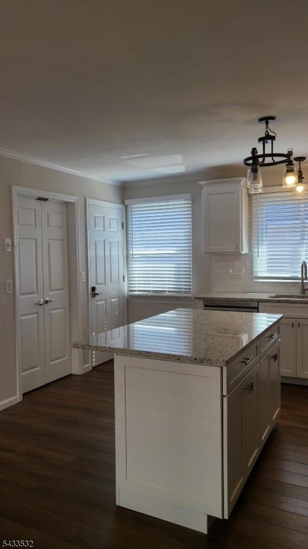 16 Ocean Street Millburn, NJ 07041 - Photo 6 of 26 a kitchen with granite countertop a sink and a stove top oven