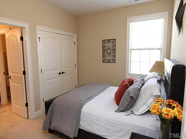 12924 Edsel Drive Raleigh, NC 27613 - Photo 19 of 25 5th bedroom upstairs, has access to the Buddy bath and plenty of closet space.