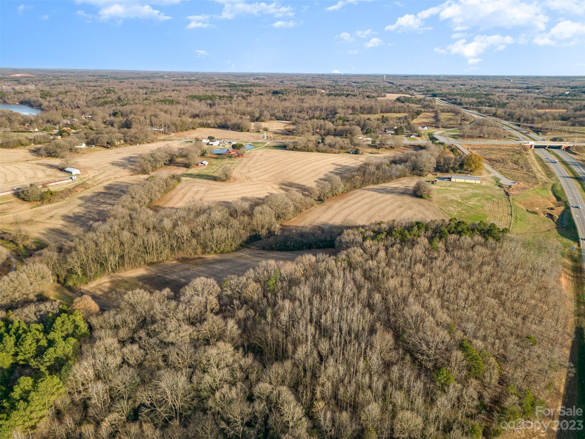 2713 Morgan Mill Road Monroe, NC 28110 - Photo 5 of 10 an aerial view of residential houses with outdoor space