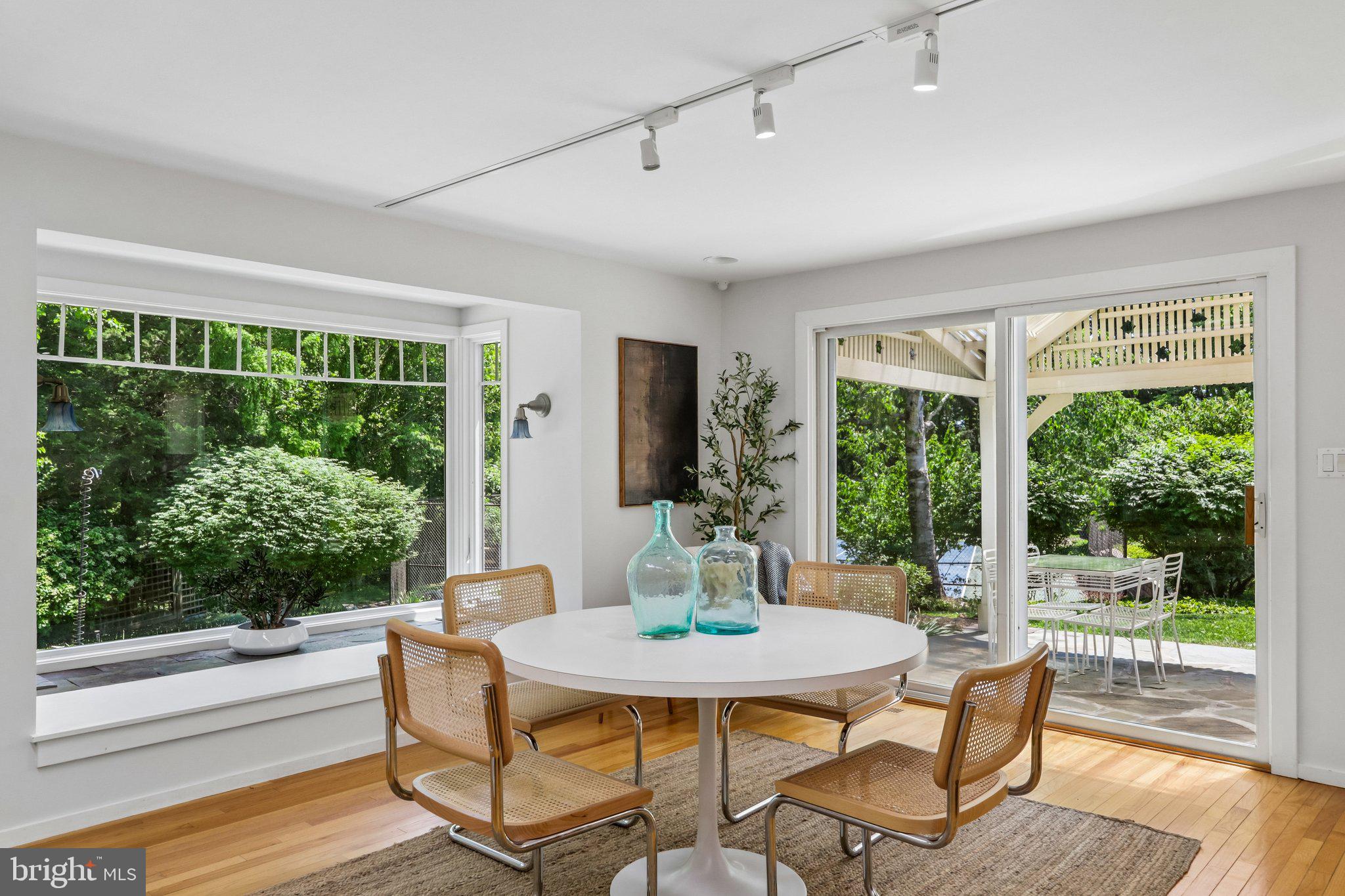 1673 Paper Mill Road Jenkintown, PA 19046 - Photo 23 of 73 a view of a dining room with furniture window and outside view