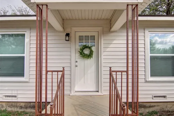 a view of a door of a house with a door