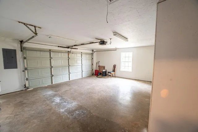 a view of a big room with closet and a window