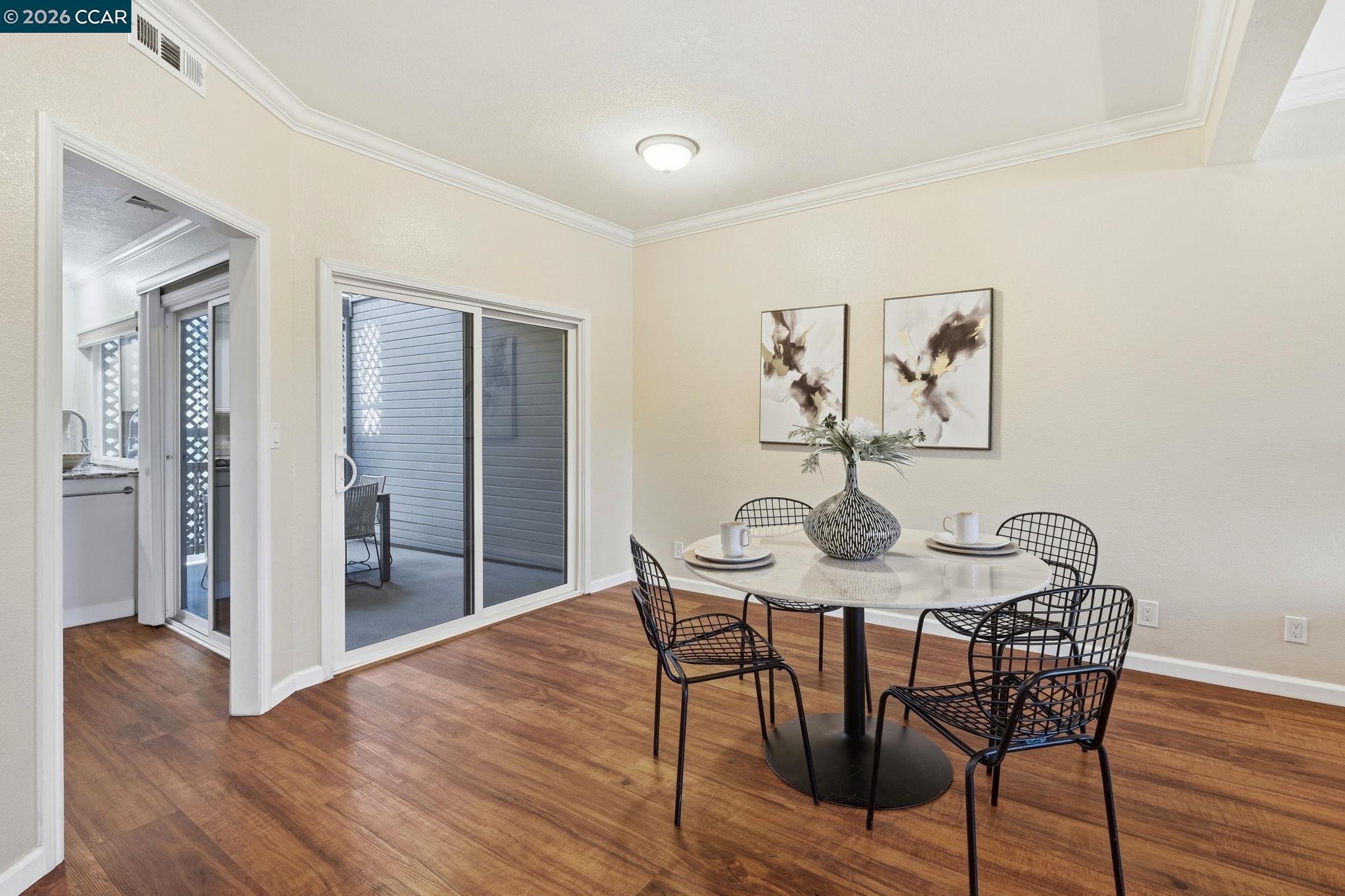 1707 Geary Road Walnut Creek, CA 94597 - Photo 13 of 43 a view of a dining room with furniture and wooden floor