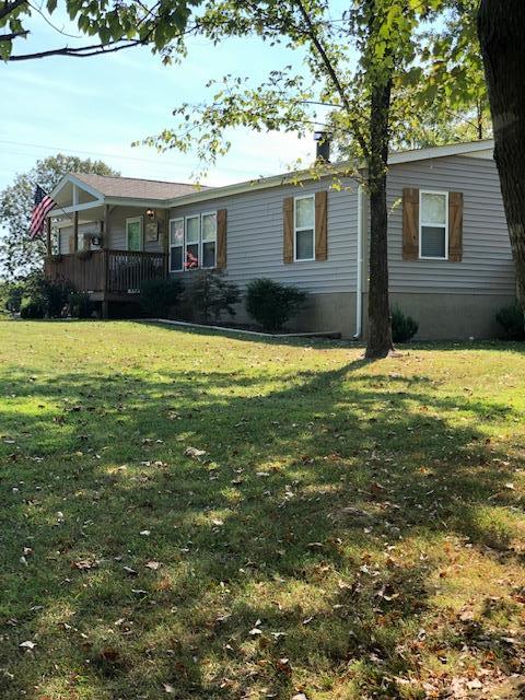 305 North Centerpoint Road Portland, TN 37148 - Photo 1 of 18 a view of a house with a yard