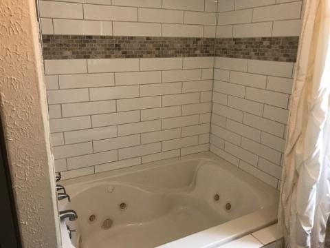 305 North Centerpoint Road Portland, TN 37148 - Photo 18 of 18 a bathroom with a bathtub