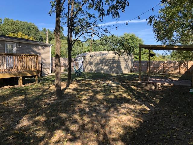 305 North Centerpoint Road Portland, TN 37148 - Photo 5 of 18 a view of a yard with wooden fence
