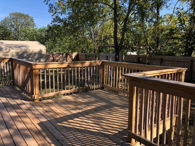 305 North Centerpoint Road Portland, TN 37148 - Photo 8 of 18 a view of deck with wooden floor and fence