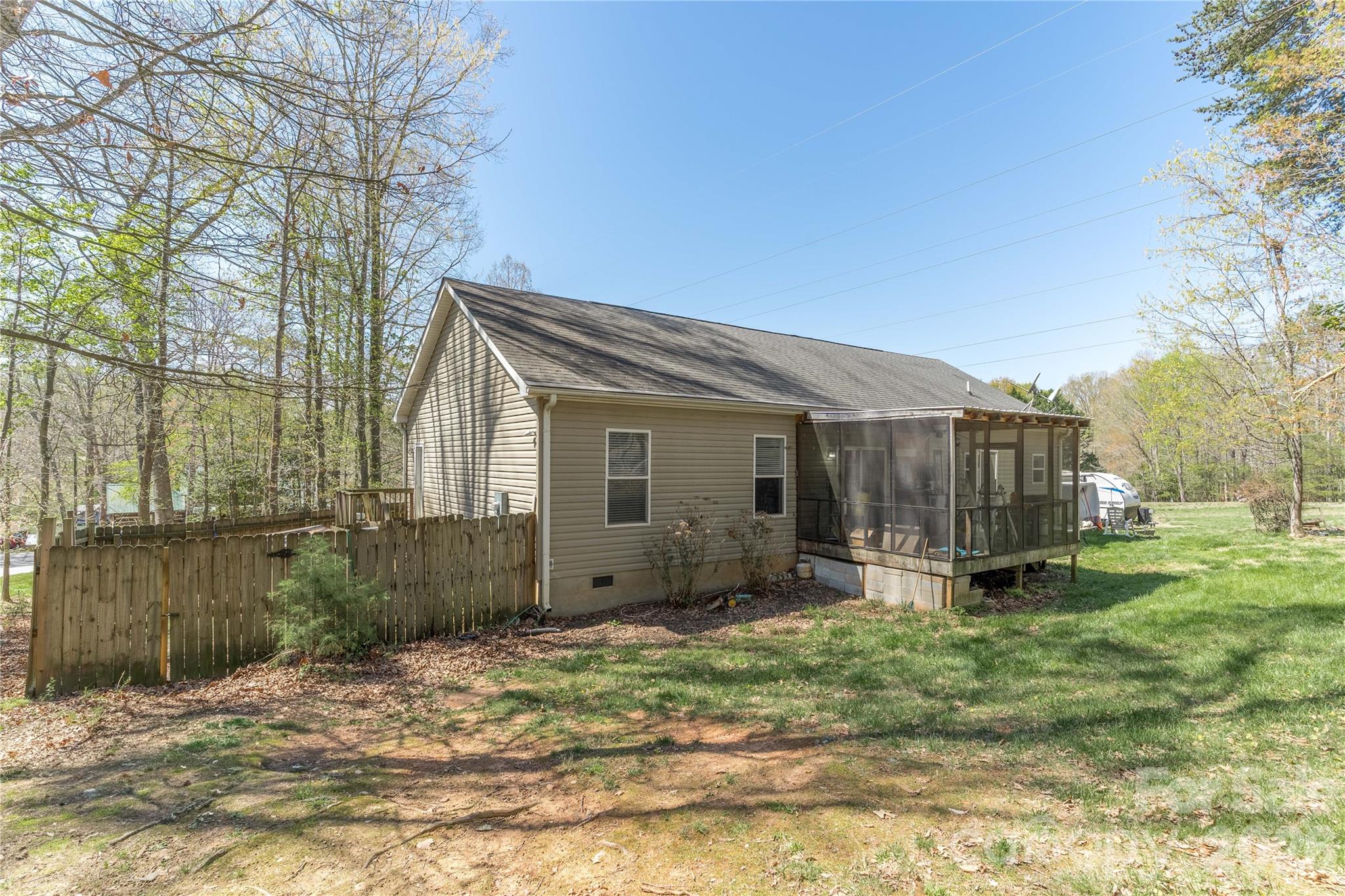 296 Stillwater Road Troutman, NC 28166 - Photo 28 of 33 a view of a house with a yard