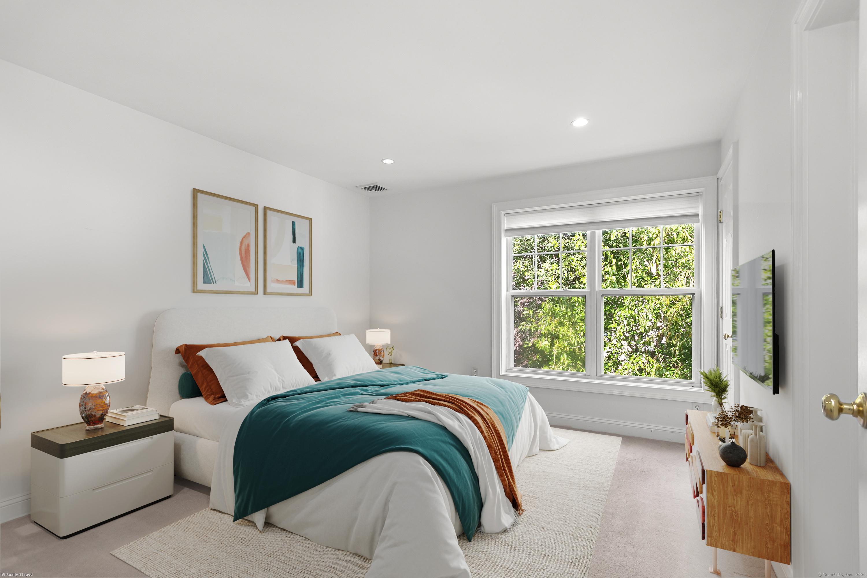 28 Rock Spring Road, Unit B2 Stamford, CT 06906 - Photo 12 of 32 a bedroom with a bed and a window