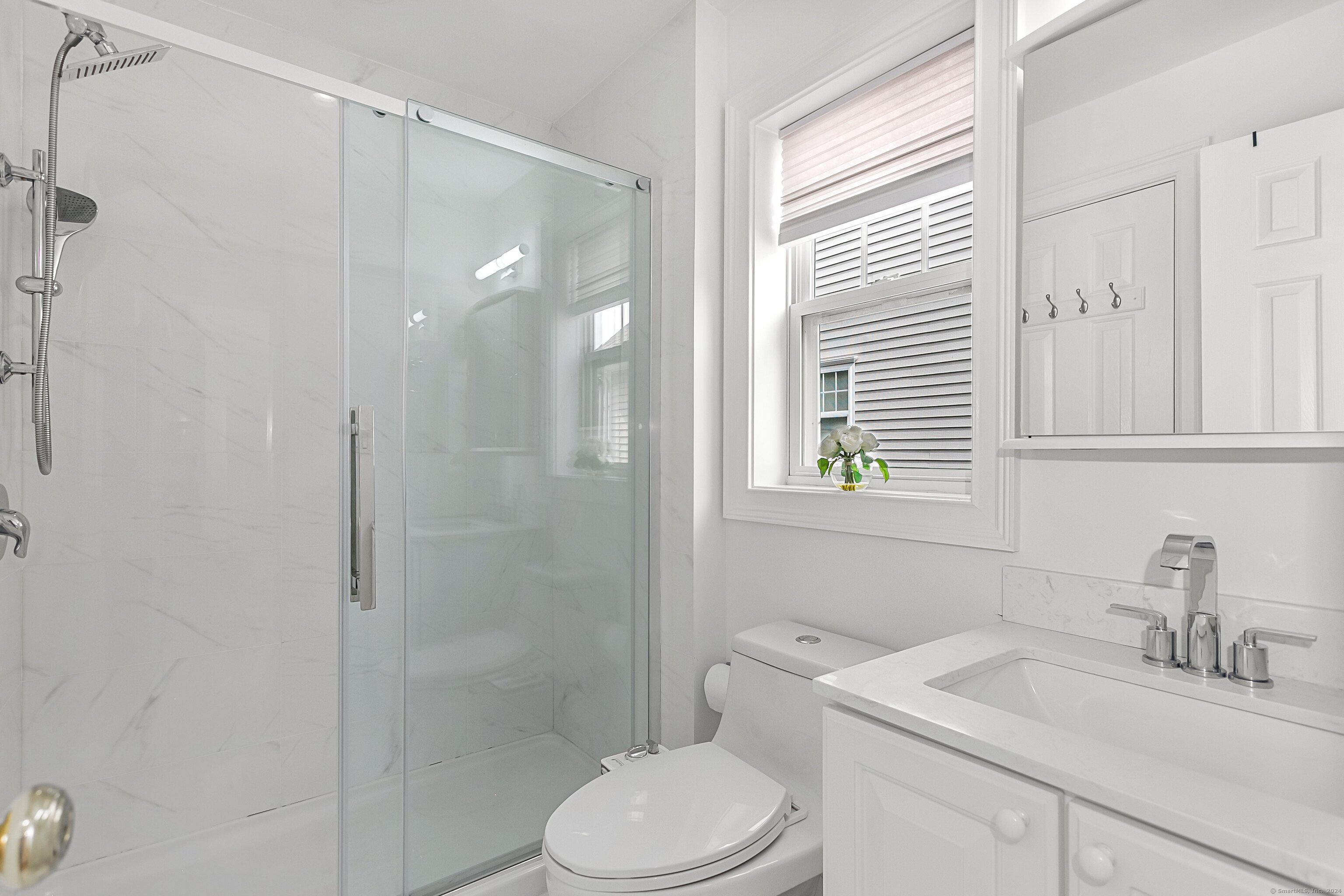 28 Rock Spring Road, Unit B2 Stamford, CT 06906 - Photo 14 of 32 a bathroom with a sink toilet and shower