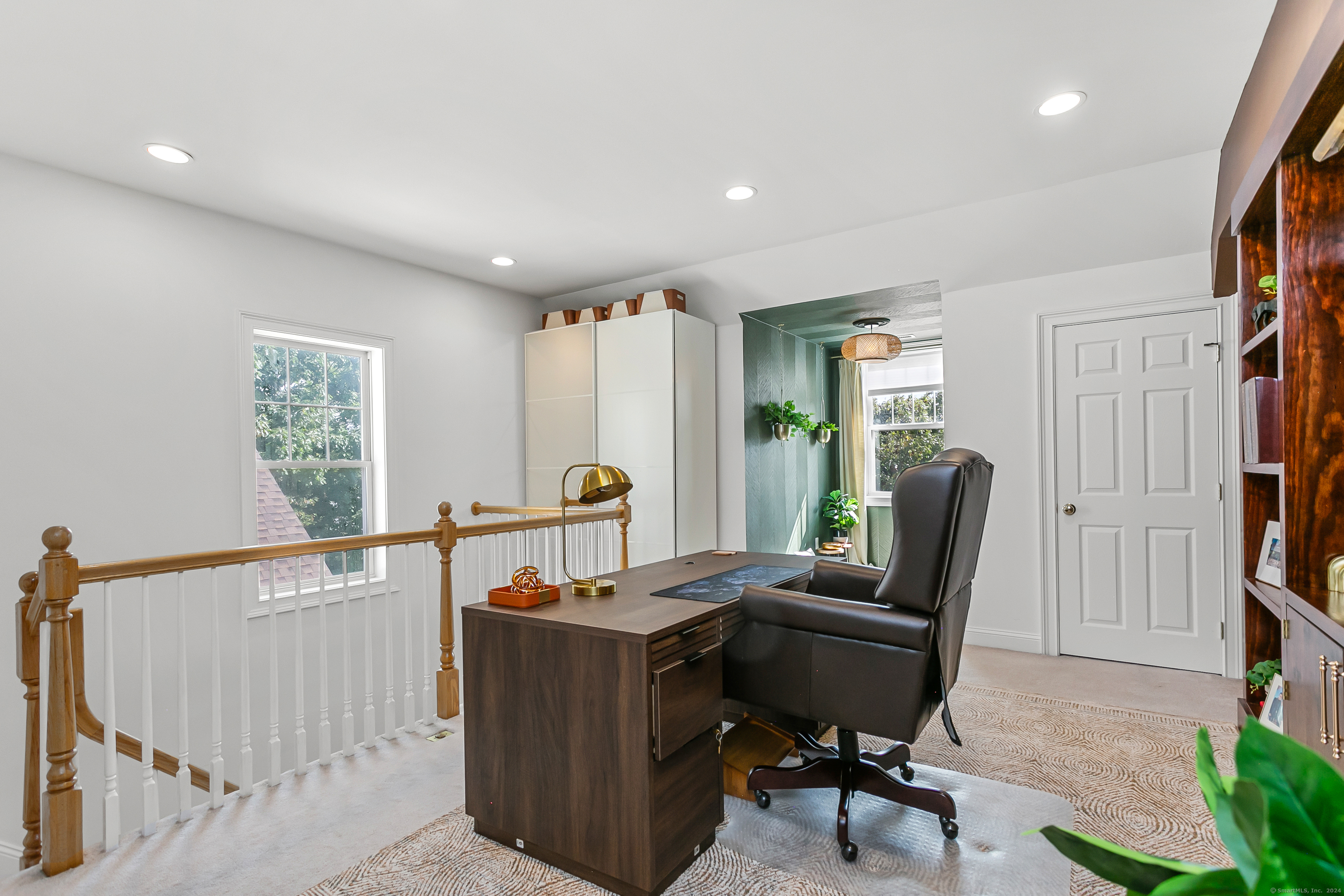 28 Rock Spring Road, Unit B2 Stamford, CT 06906 - Photo 26 of 32 a view of a workspace with furniture and a window